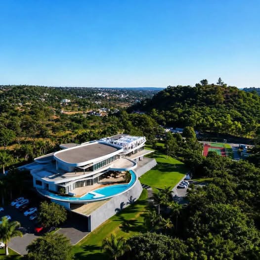 Aerial view of a private residence with pool and tennis court built by Vebrech Civil Works